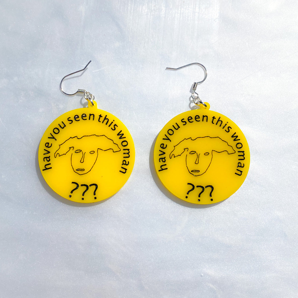 Have you seen this woman? Earring